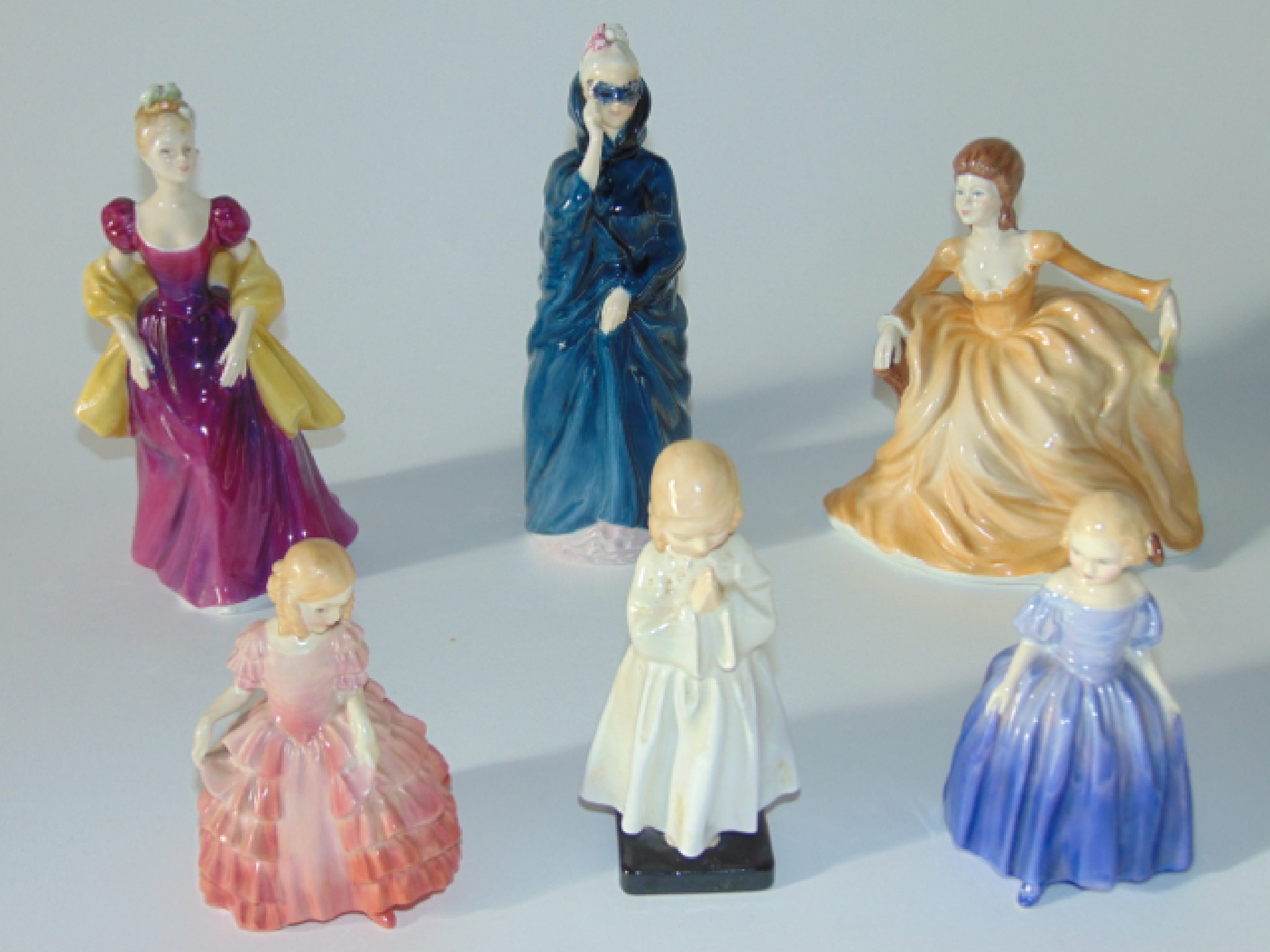 Appraisal: A collection of Royal Doulton figures comprising Masque HN Loretta