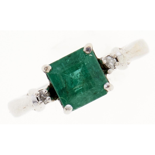 Appraisal: An emerald and diamond ring with larger central step cut