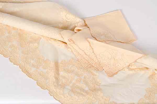 Appraisal: Organdy Tablecloth with Napkins Chinese ca s hand-appliqu d peach