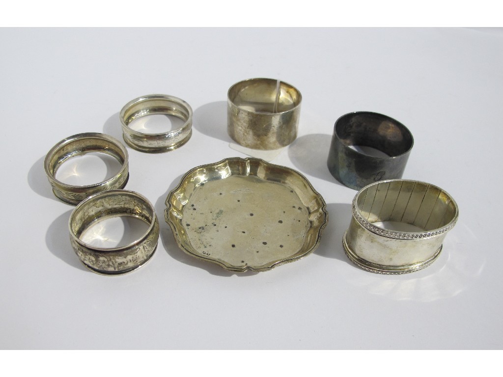 Appraisal: A lot comprising six silver napkin rings and a silver