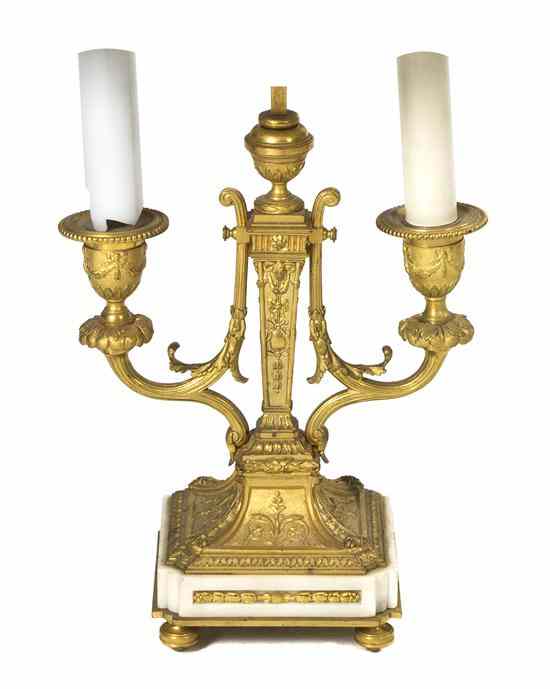 Appraisal: A Louis XVI Gilt Bronze and Marble Two-Light Candelabrum having