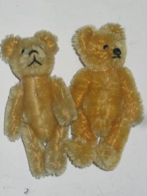 Appraisal: A pair of Schuco miniature teddy bears tin plate construction