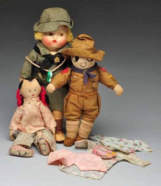 Appraisal: Lot of Cloth Boy and Girl Scout Dolls Description Unusual