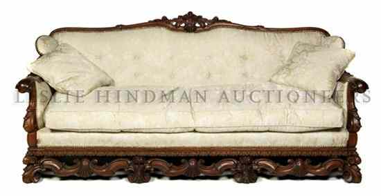 Appraisal: A Renaissance Revival Style Sofa having upholstered back arms and