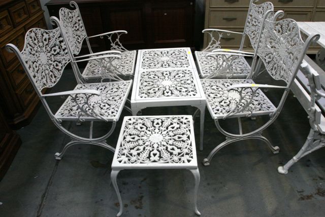 Appraisal: An aluminium outdoor coffee table and four chairs