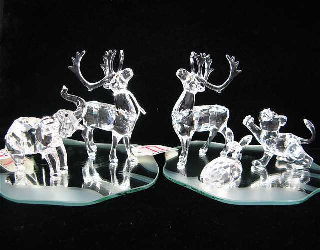 Appraisal: FIVE SWAROVSKI AUSTRIAN ANIMAL FIGURES includes a pair Reindeer both