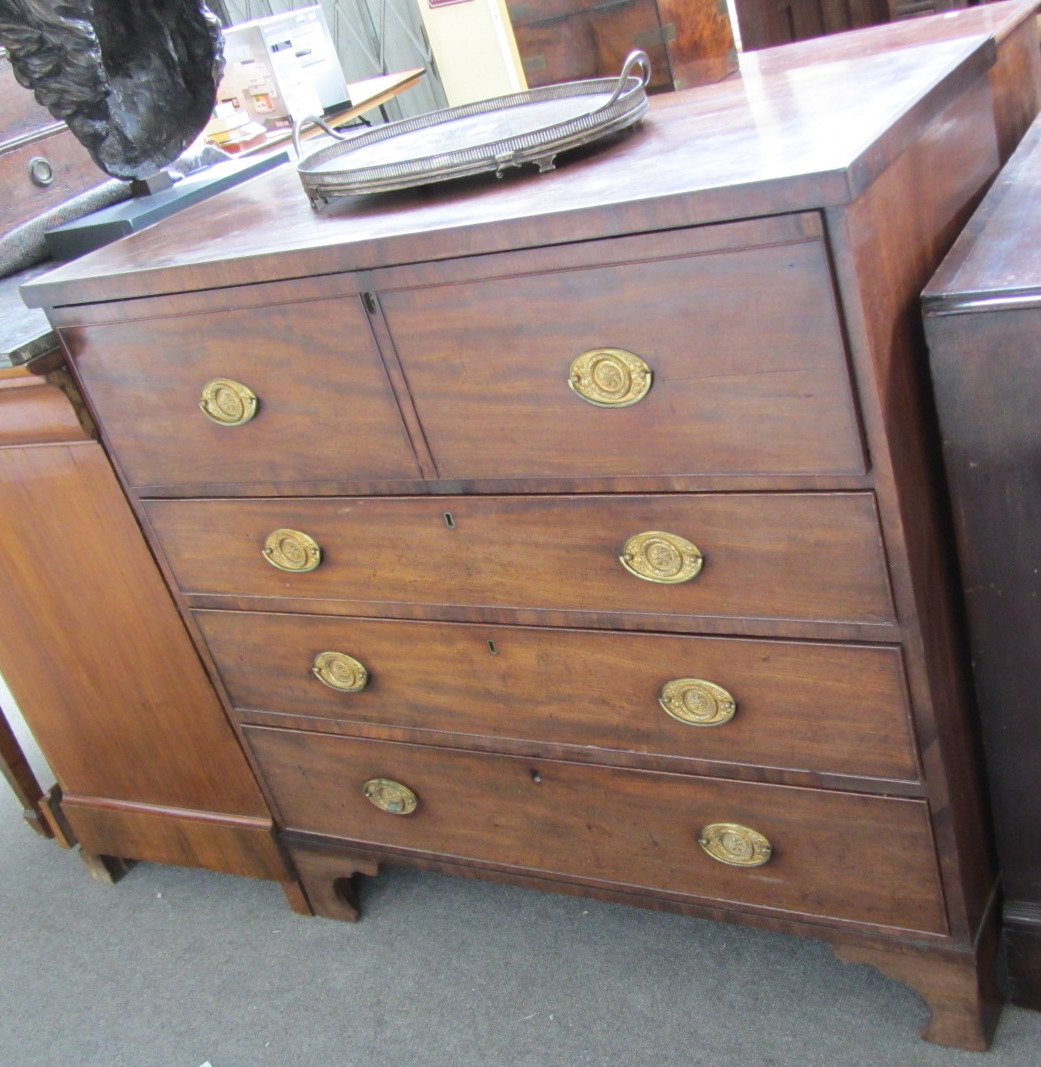 Appraisal: A George III mahogany inlaid secretaire chest the fitted drawer