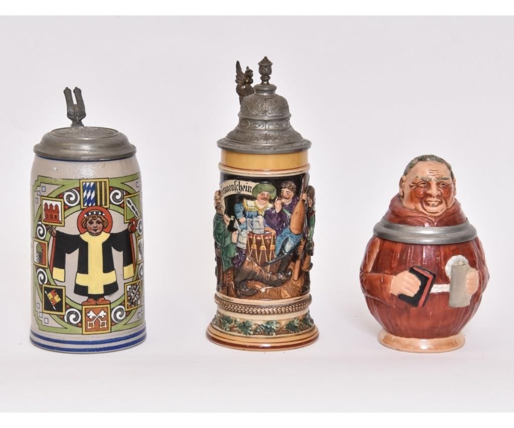 Appraisal: Three German steins the largest marked dated litre one marked