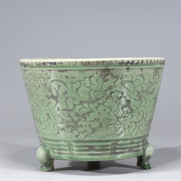 Appraisal: Chinese celadon glazed tripod censer with incised floral designs to