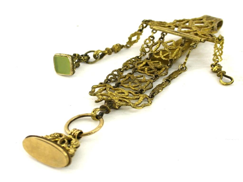 Appraisal: Pierced gilt metal chatelaine with two fob pendants long