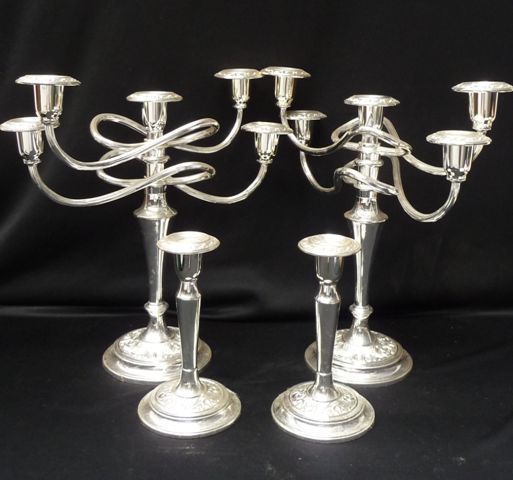 Appraisal: A set of English silver plate candlesticks Two of five