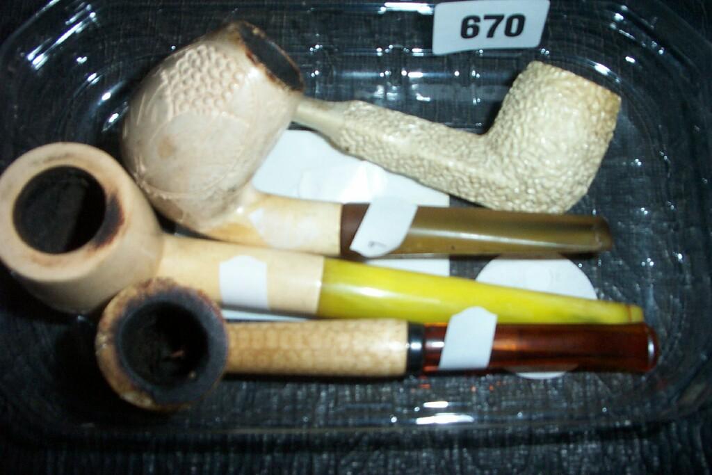 Appraisal: A collection of four old Meerschaum type pipes with fruiting