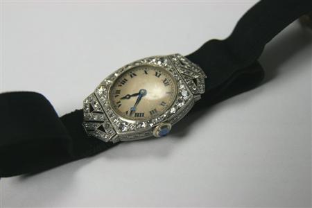 Appraisal: An early th century lady's diamond set cocktail watch the