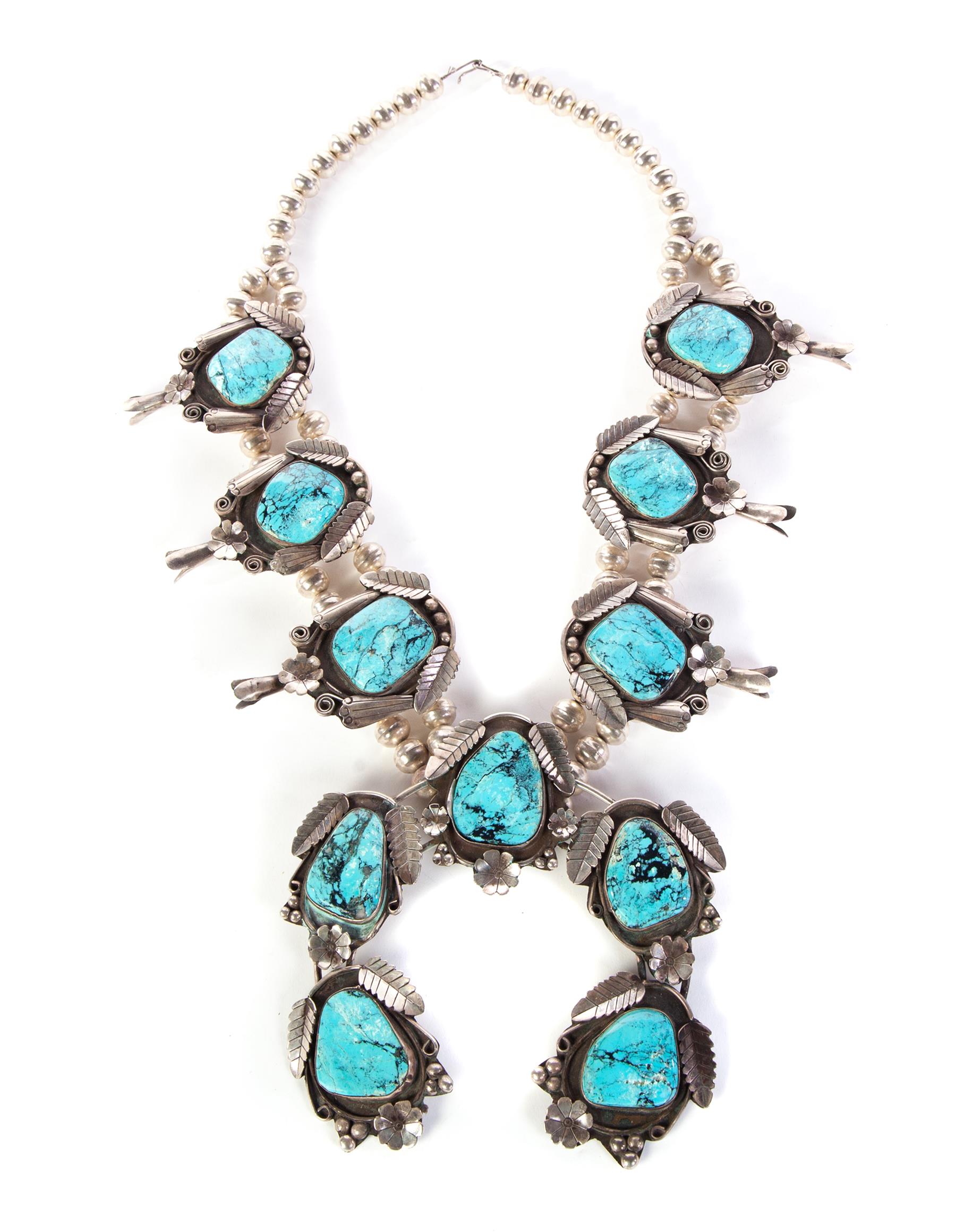 Appraisal: HEAVY SILVER AND TURQUOISE SQUASH BLOSSOM NECKLACE American th century