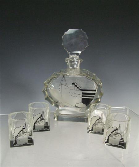 Appraisal: ART DECO LIQUEUR SET CIRCA clear glass comprising a decanter