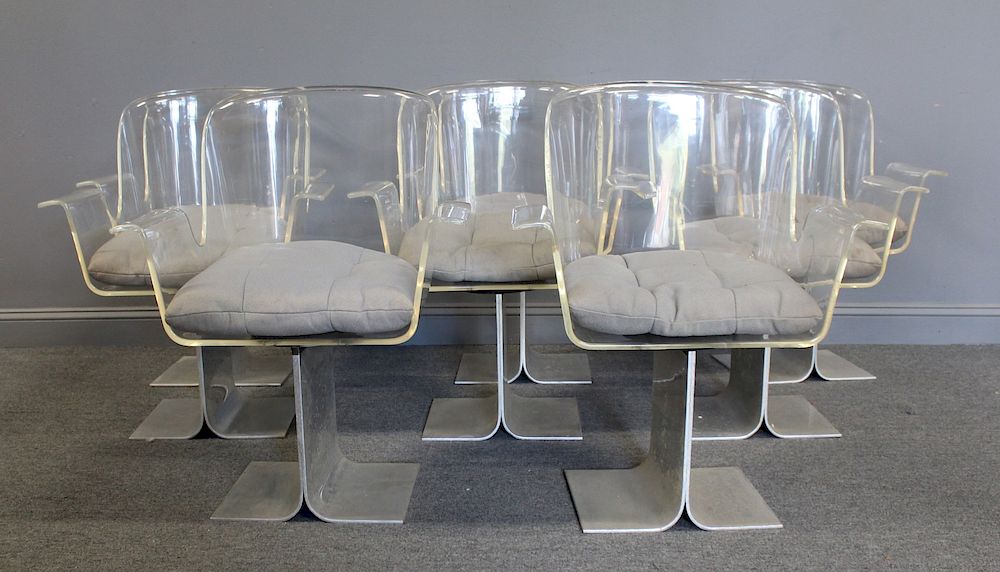 Appraisal: MIDCENTURY Lucite and Steel Base Chairs From a New Jersey