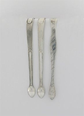 Appraisal: One bright-cut and two part-fluted pairs of sugar tongs all