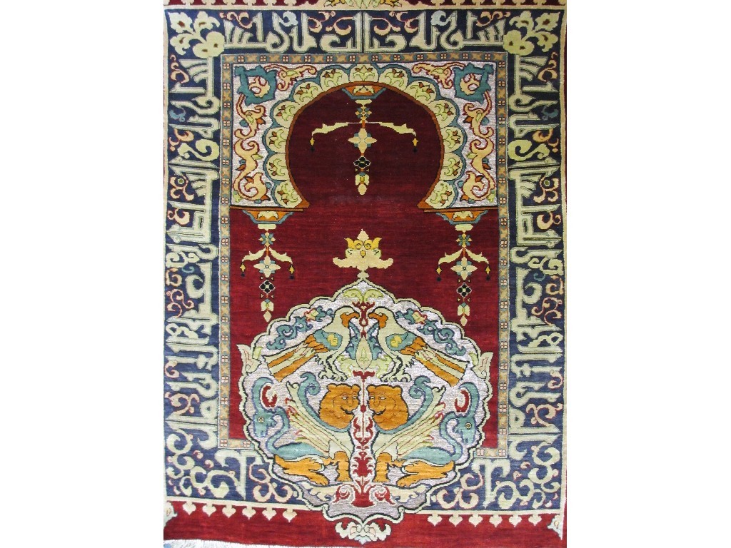 Appraisal: A silk embroidered hanging with central mirrored image of a