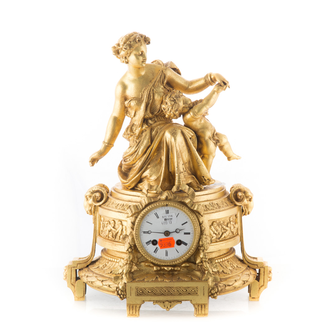 Appraisal: Louis XVI style gilt-metal figural mantel clock classical decoration in