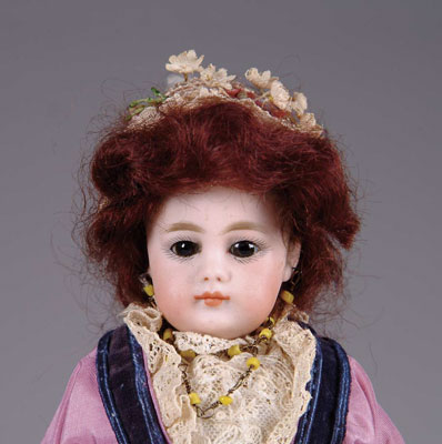 Appraisal: - STIFF NECK GERMAN FASHION DOLL Elaborately costumed this German