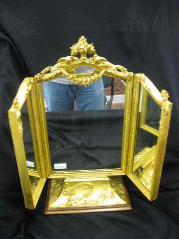 Appraisal: French Dressing Mirror fold out sides fancy gold decoration with