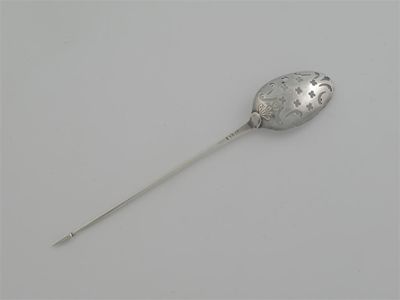 Appraisal: A George II III mote spoon with pierced crosslets fancy-back