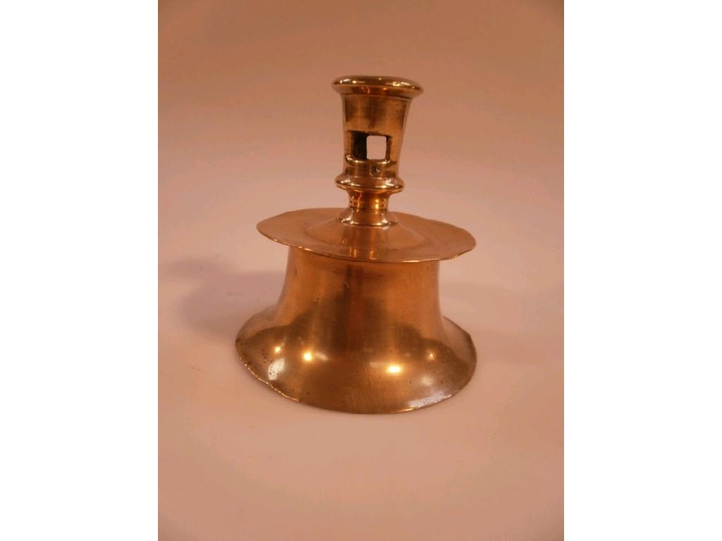 Appraisal: A thC brass 'Capstan' candlestick cm high