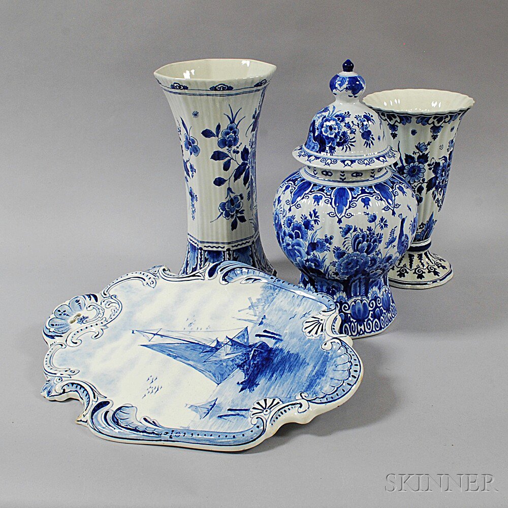 Appraisal: Four Delft Blue and White Items th century two vases