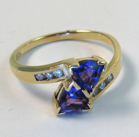 Appraisal: AMETHYST DIAMOND AND TEN KARAT GOLD RING set with two