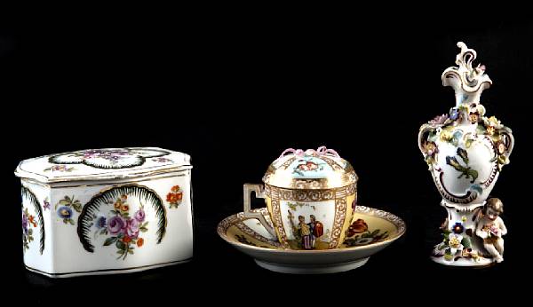 Appraisal: A group of eight porcelain table articles comprising a flower