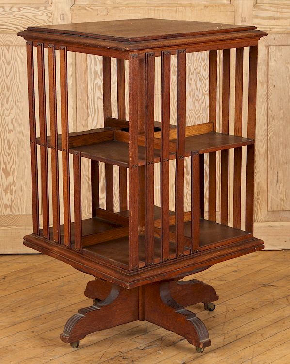 Appraisal: A REVOLVING OAK BOOKCASE A revolving oak bookcase Ht Wd