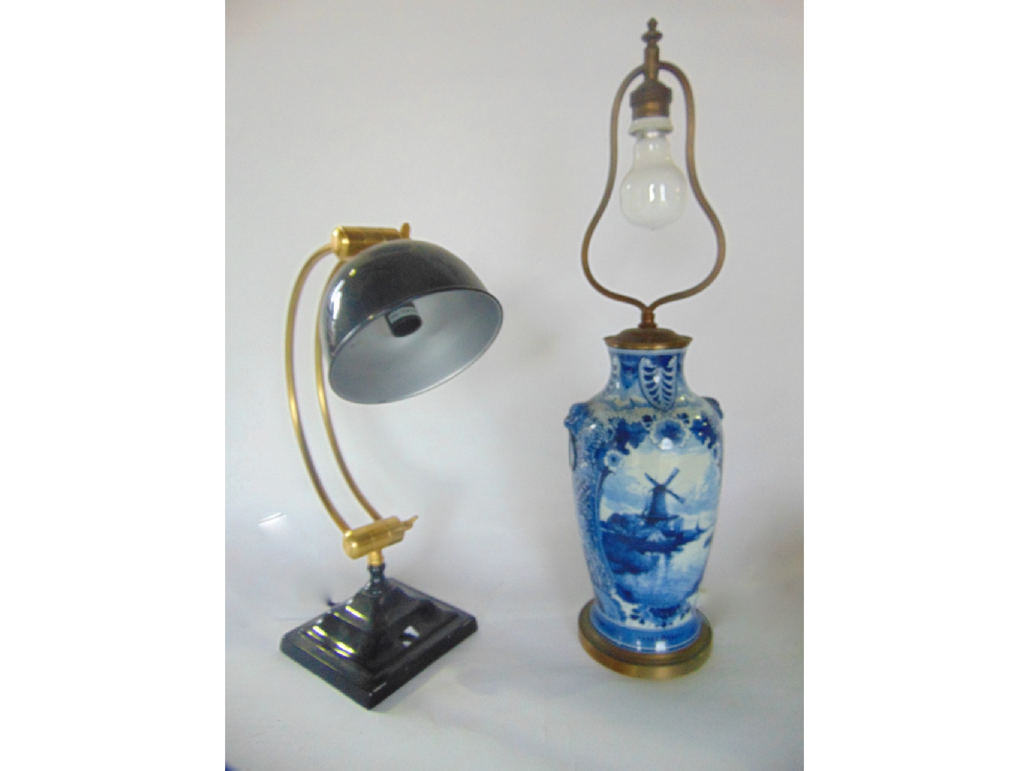 Appraisal: A desk lamp in the form of a continental Delft