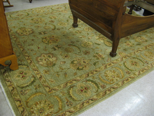 Appraisal: HAND KNOTTED ORIENTAL CARPET Indo-Persian overall floral decoration on light