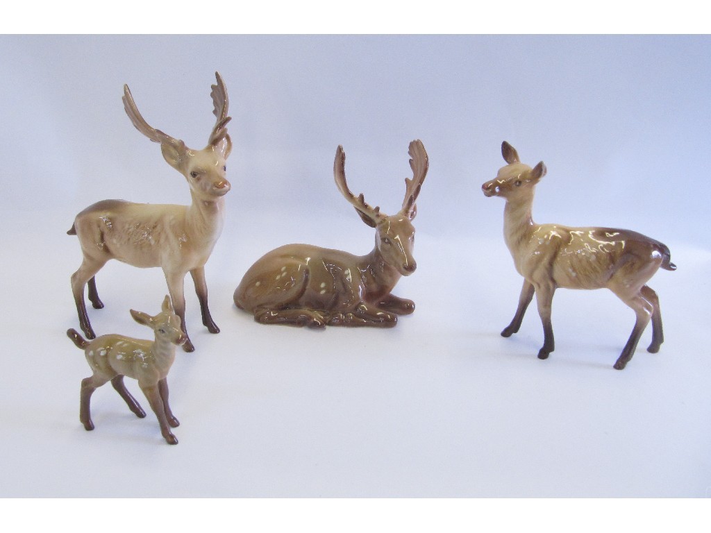 Appraisal: Four Beswick deer figures