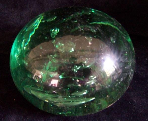 Appraisal: A large green glass dump circular