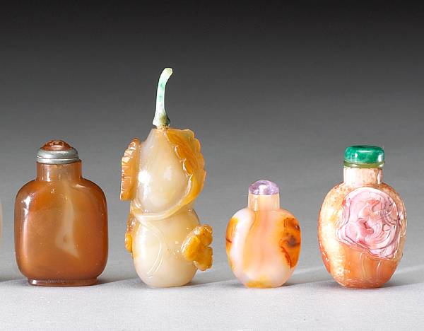 Appraisal: Four agate snuff bottles Two smoothly finished one with chip