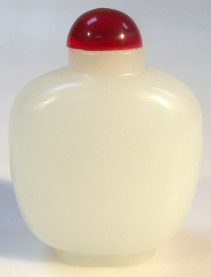 Appraisal: An oriental jade perfume bottle the shouldered body with a