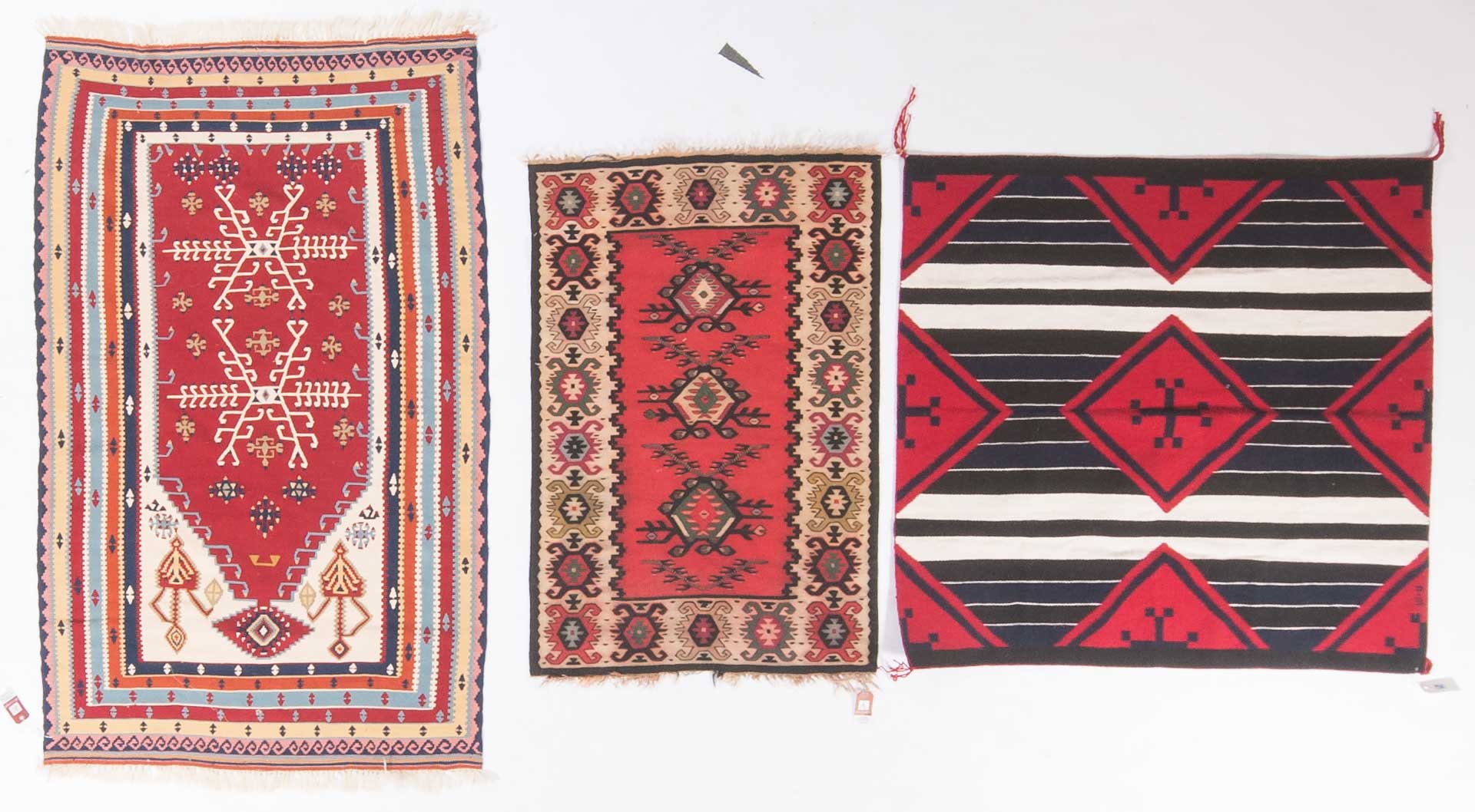 Appraisal: Two Kelim rugs and a Navajo rug approximately x x