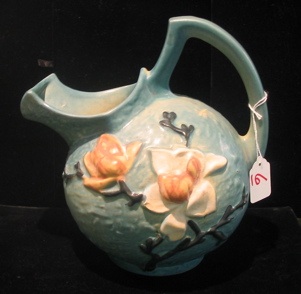 Appraisal: A ROSEVILLE ART POTTERY CIDER PITCHER in the Blue Magnolia