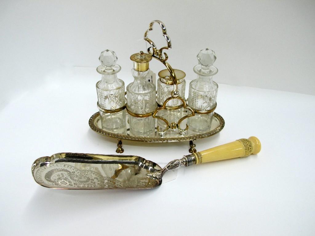 Appraisal: A lot comprising a four bottle cruet stand and an