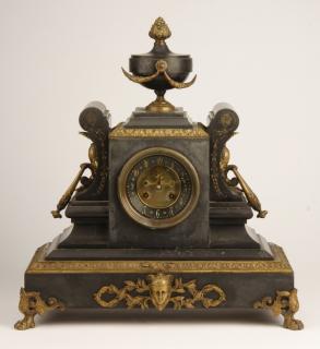 Appraisal: th c French bronze black marble clock Mid th century