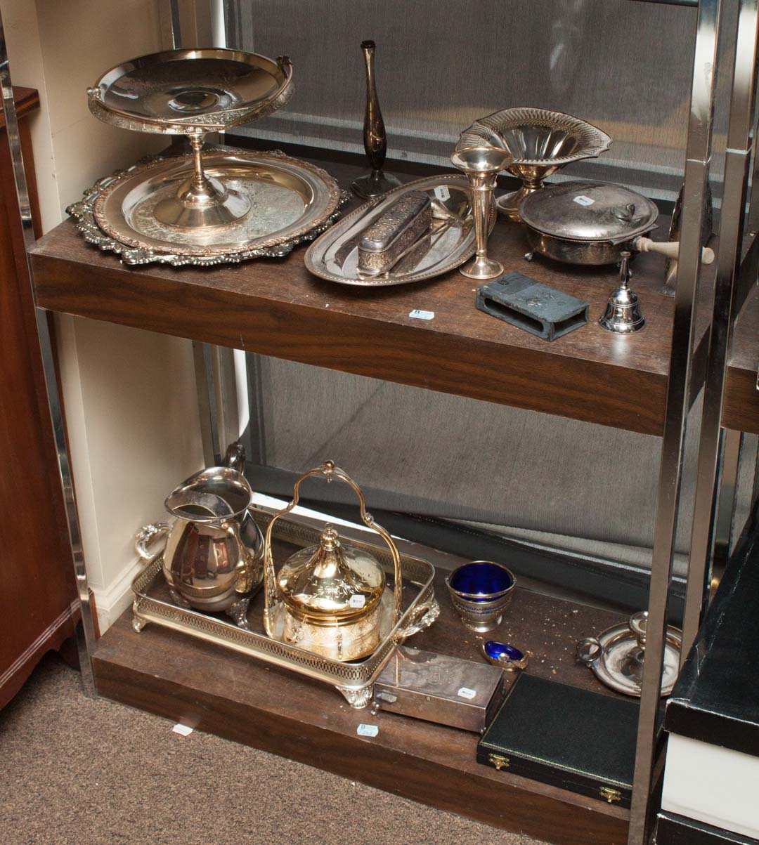 Appraisal: Two shelves of silver plate items