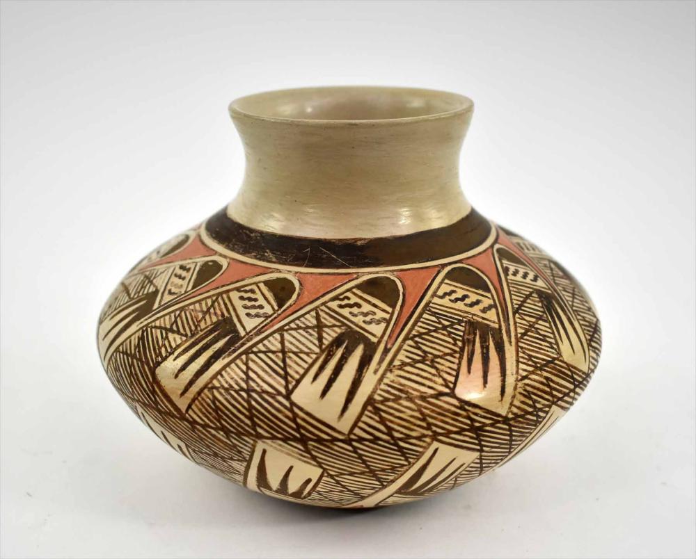 Appraisal: NAMPEYO PUEBLO PAINTED EARTHENWARE SEED JARTonita Hamilton the underside signed