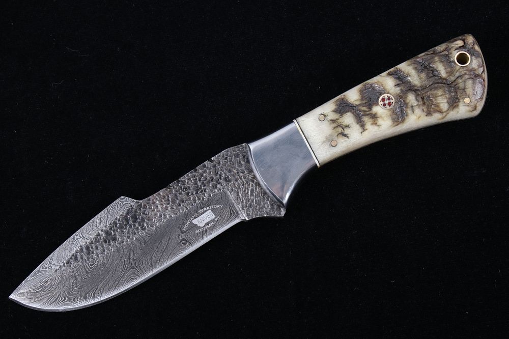 Appraisal: M T Knives Rams Horn Damascus Hammered Knife This is