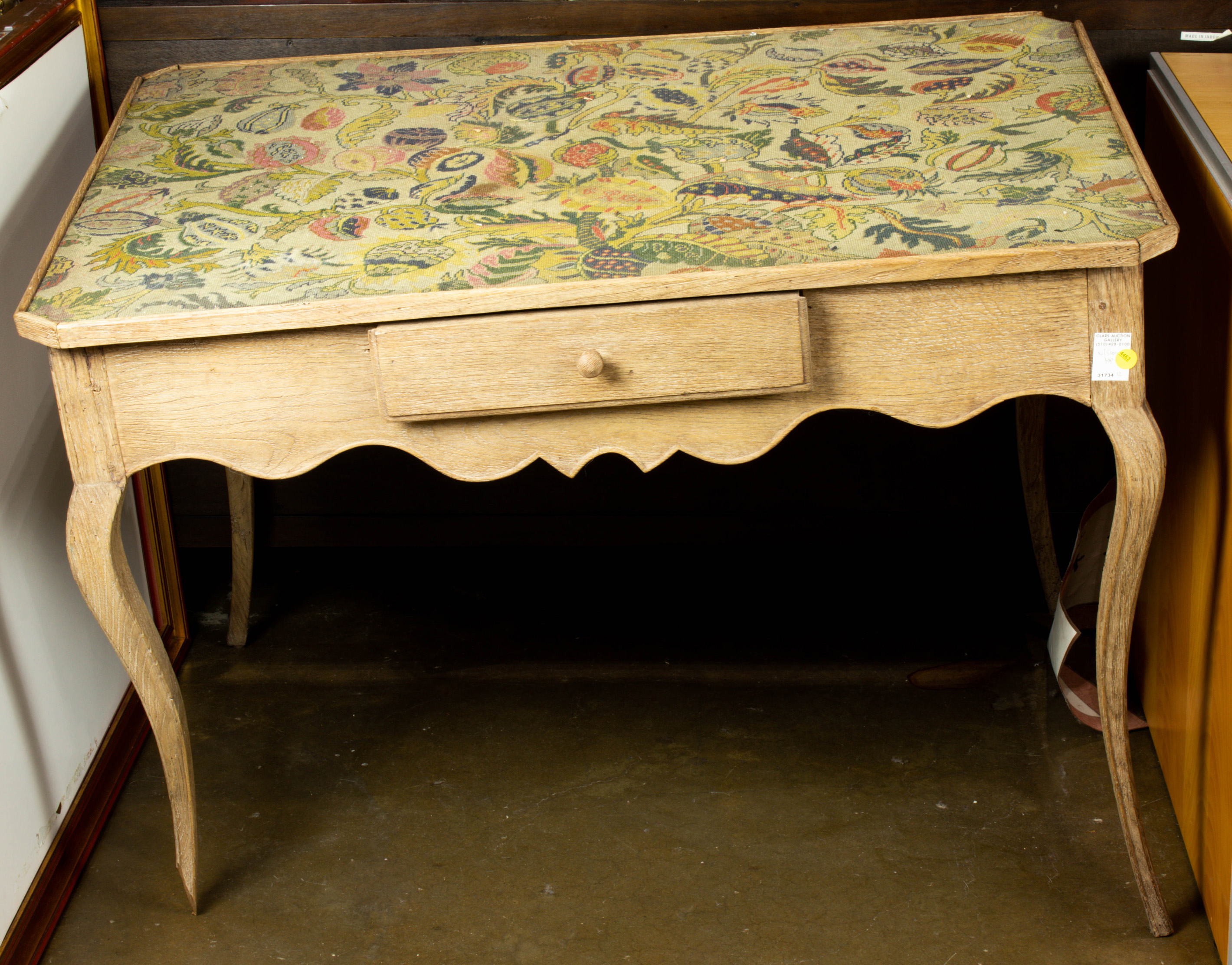 Appraisal: FRENCH PROVINICAL STYLE LIMED LIBRARY TABLE HAVING A SINGLE DRAWER