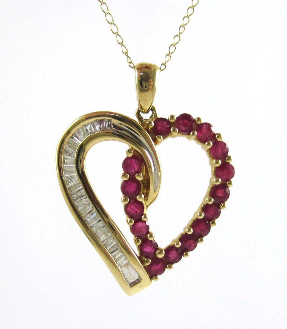 Appraisal: RUBY DIAMOND AND FOURTEEN KARAT GOLD PENDANT NECKLACE with a