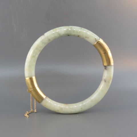 Appraisal: Jade K Gold Bangle Bracelet apple green jade