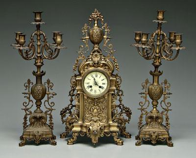 Appraisal: Louis XV style bronze clock garniture clock with urn pediment