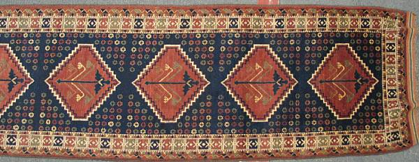 Appraisal: A Baluch runner size approximately ft in x ft in