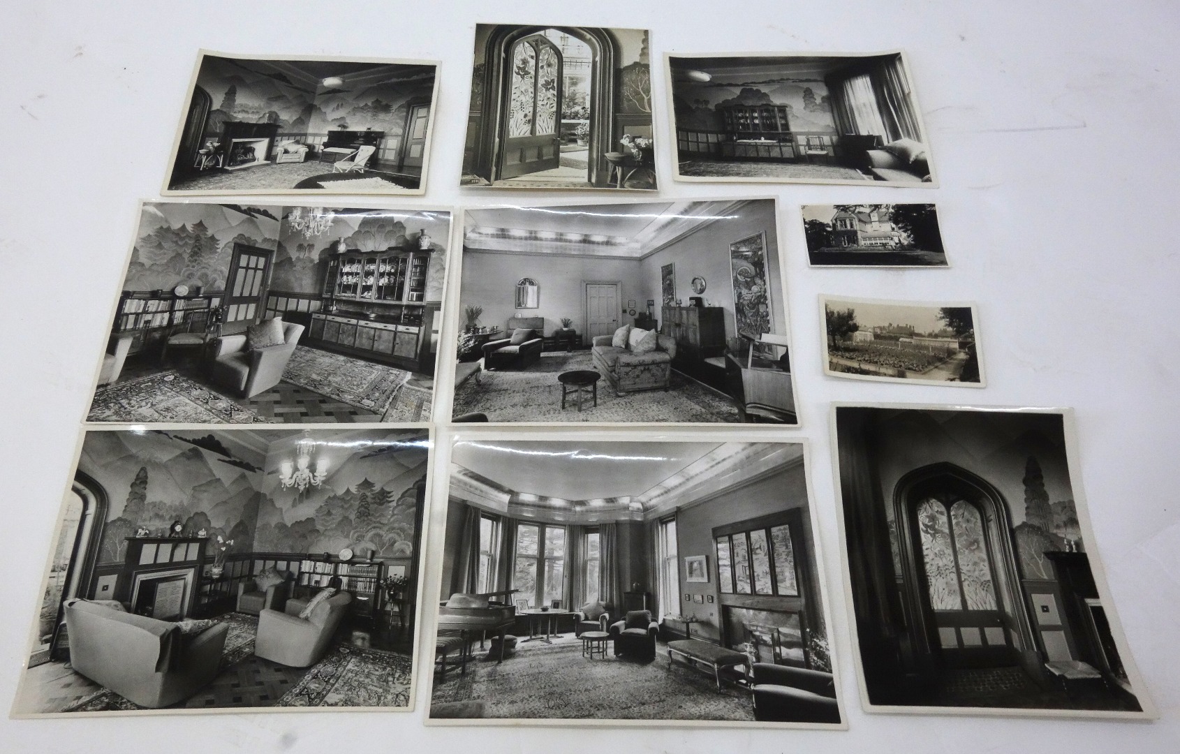 Appraisal: A collection of eight photographs of interior scenes containing Cotswold